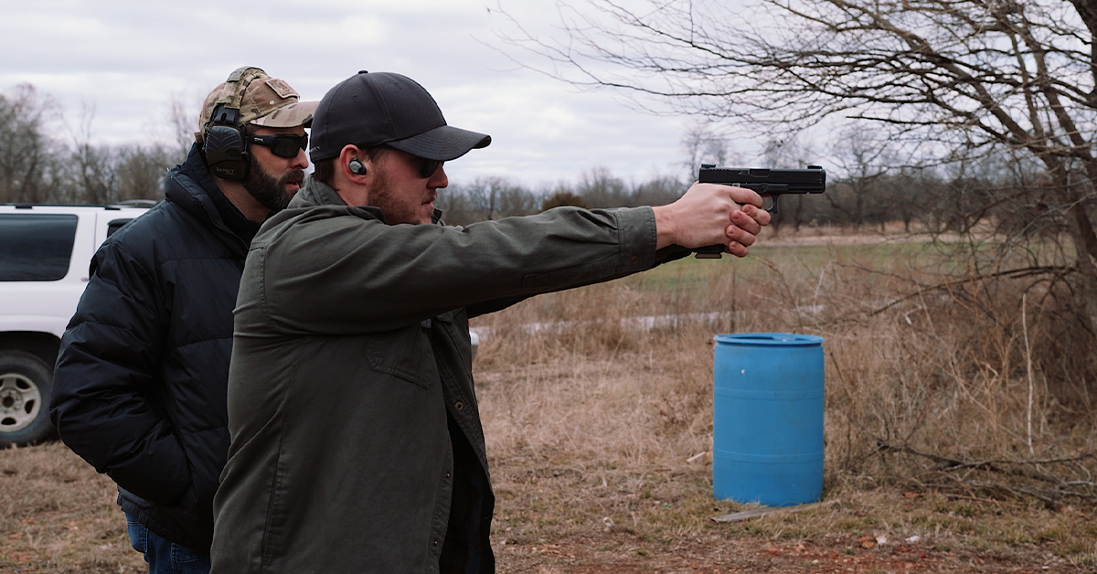 man training with firearm