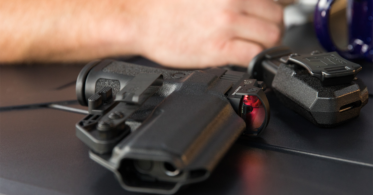 handgun in holster and mag carrier